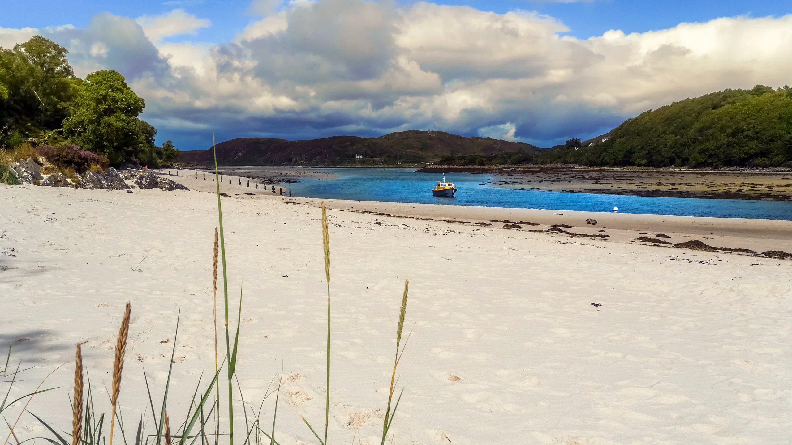 Pale sands and clear coastal water at the Silver Sands of Morar